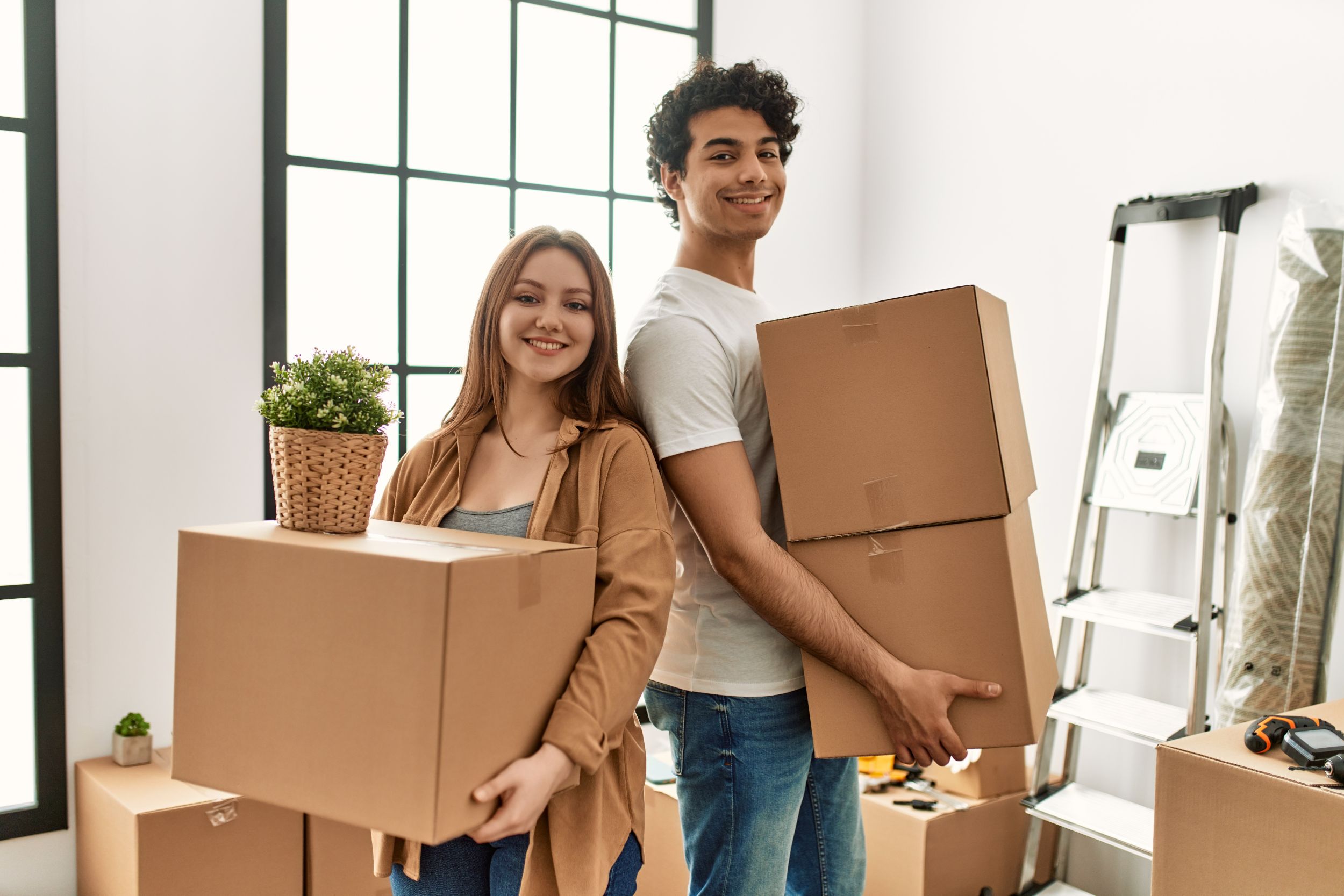 Young couple smiling happy holding cardboard boxes at new home. — Photo To download this image, create an account Sign up with Google Sign up with Facebook Sign up with Email Already have an account? Log In By clicking on Sign up, you agree to Depositphotos Membership Agreement